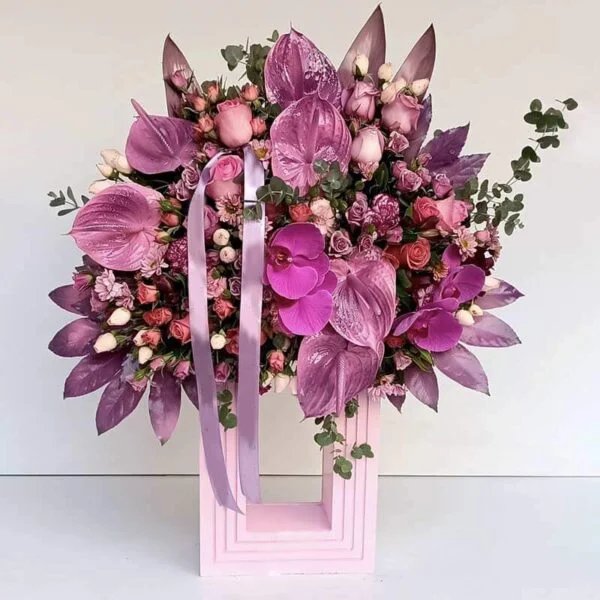 Main image of Super Luxury Flower Stand with Pink Roses, Orchids, and Decorative Leaves – Perfect for Surprising Ladies
