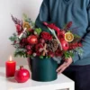 Yalda Floral Gift Box – Luxurious Holiday Arrangement in a Green Box with Red Roses, Pinecones, Pomegranates